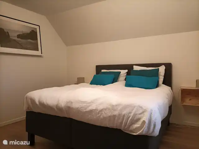 De grote slaapkamer, inclusief bedlinnen